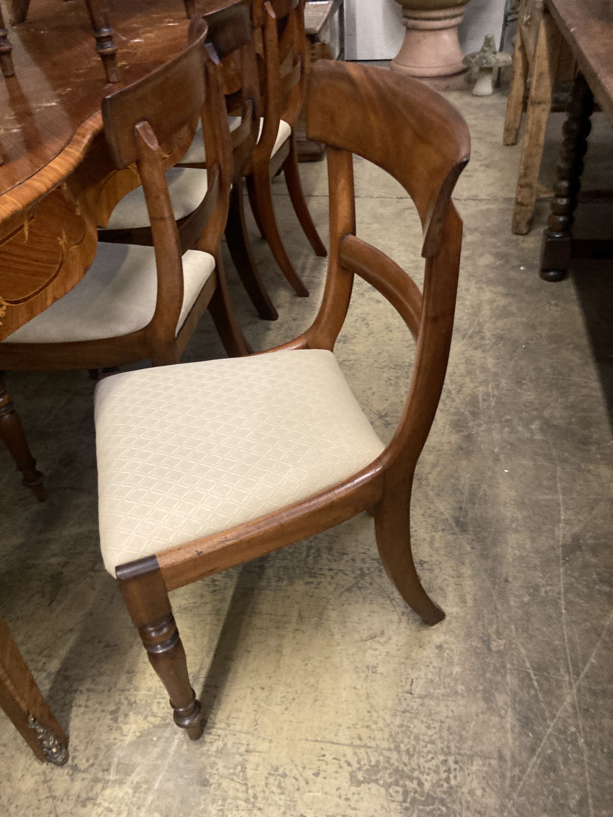 A harlequin set of eight early Victorian mahogany dining chairs